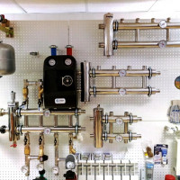 Système de chauffage à circulation naturelle: conceptions de circuits d'eau communs