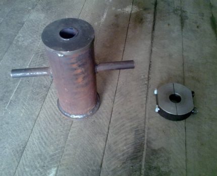 Bir iğneyi yere çekiçlemek için çekiç kafası Baba ve podbabok, bir iğne kuyusunun toprağa daldırılması için