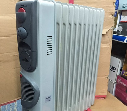 Quel chauffe-huile est meilleur à un prix moyen Modèle Resanta-OM-7NV