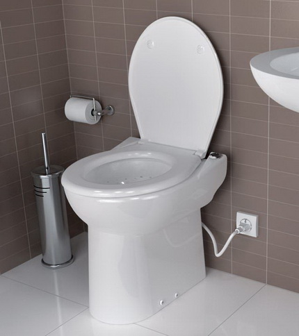 Toilet bowl with integrated pump