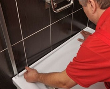 How to glue the corner to the edge of the bathtub Corner mounting