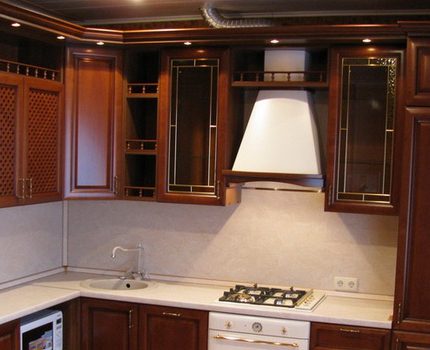 Aluminum corrugation instead of hood Aluminum corrugation on the background of an expensive kitchen set