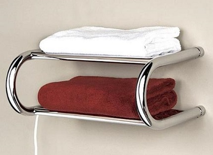 Compact electric heated towel rail with shelf Electric heated towel rail