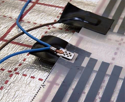 Règles d'installation d'un plancher chaud sous le stratifié Isolation du bitume des contacts