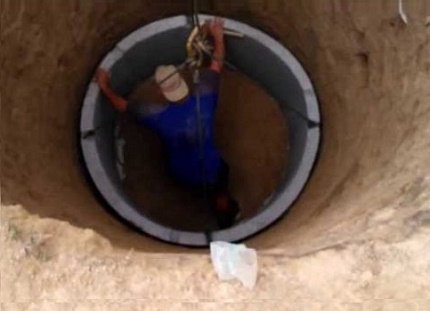 Installation d'anneaux pour un puisard