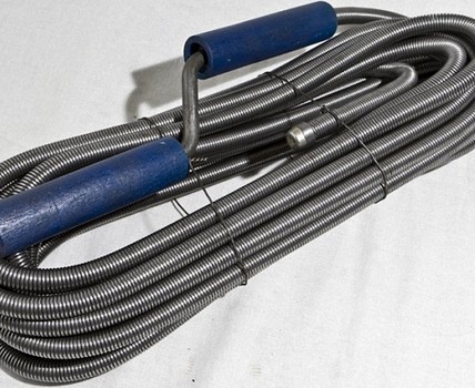 Comment nettoyer les toilettes avec un câble à ressort Tendeur Spiral