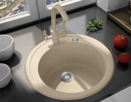 Granite washbasin with matching faucet Granite sink