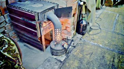 Kombiniertes Design eines Altölofens Kombinierter Dickbauchofen