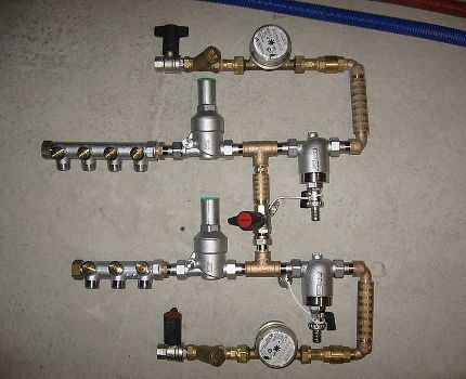 Safety group with combs for collector water distribution in the apartment Collector group