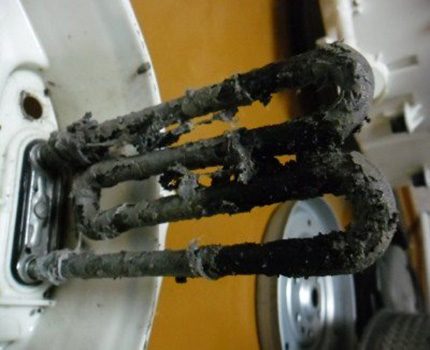 Sediment auf dem Heizelement der Waschmaschine Zehn der Waschmaschine