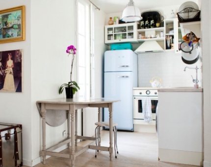 Installation of an old refrigerator in the country Old fridge in the country