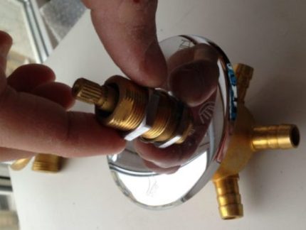 Dismantling the shower faucet