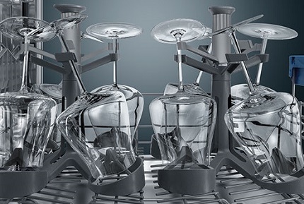 Wine glasses in a dishwasher tank