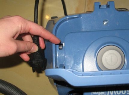 Activator button for automatic winding of the cord Cord Reel Lock Button