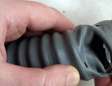 Rupture of corrugated hose