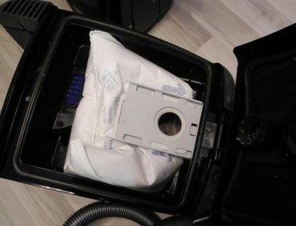 Sac à poussière avec serrure