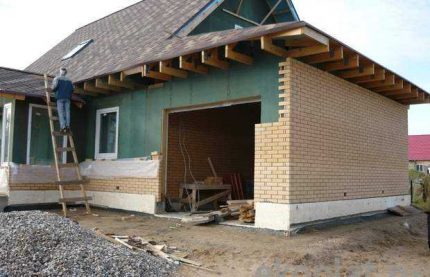 Utilisation d'isospan de grade A dans un dispositif de toiture Izospan A, comme une barrière coupe-vent