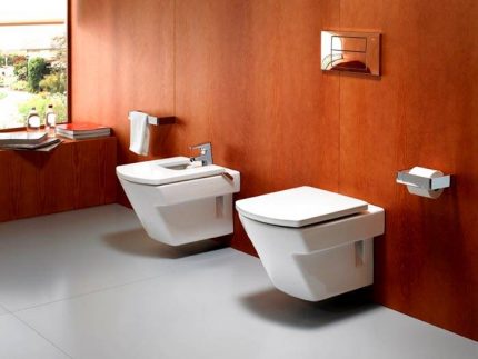 Floor-load installation Wall hung toilet
