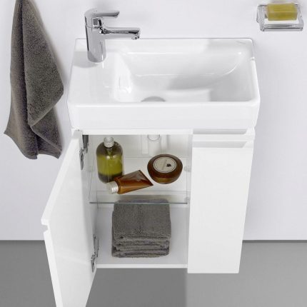 Tiny sink with a spacious nightstand Rectangular washbasin