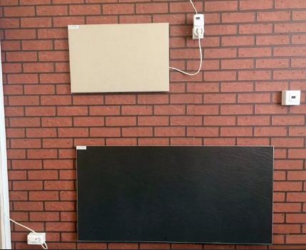 Panneau infrarouge et thermostat à la sortie Panneau infrarouge et thermostat à la sortie