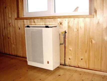 Pencerenin altına bir gaz konvektörünün monte edilmesi Pencerenin altına bir gaz konvektörünün monte edilmesi