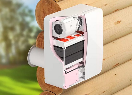 Installation d'un reniflard dans un mur en rondins Installation d'un reniflard dans un mur en rondins